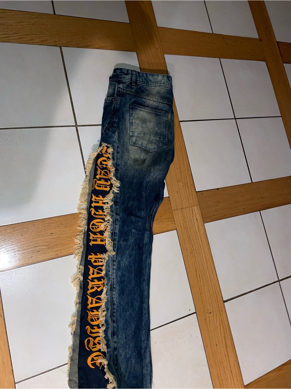 Men's Distressed Blue Denim Jeans with Yellow Script Side Detail